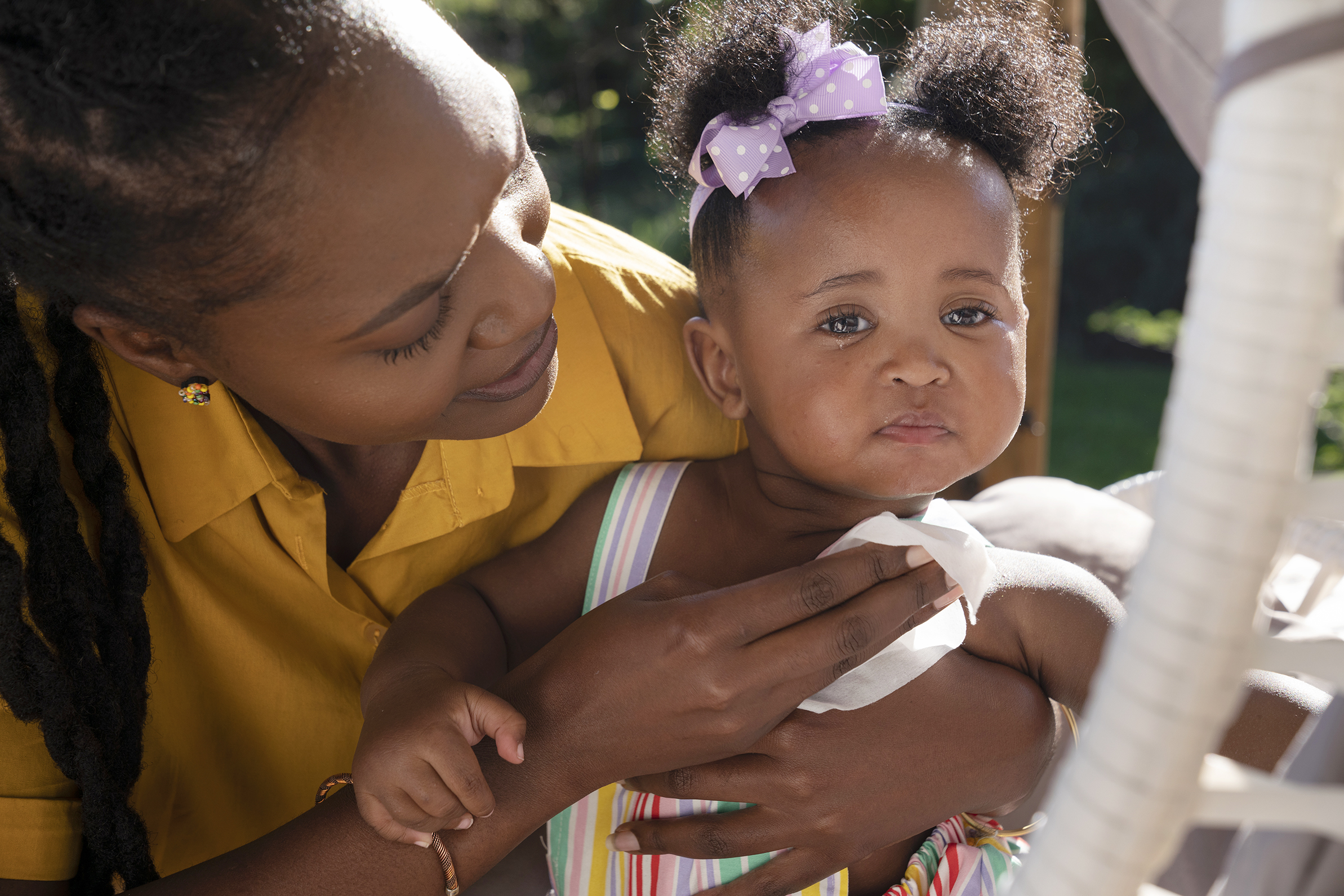 cute-black-baby-home-with-parents