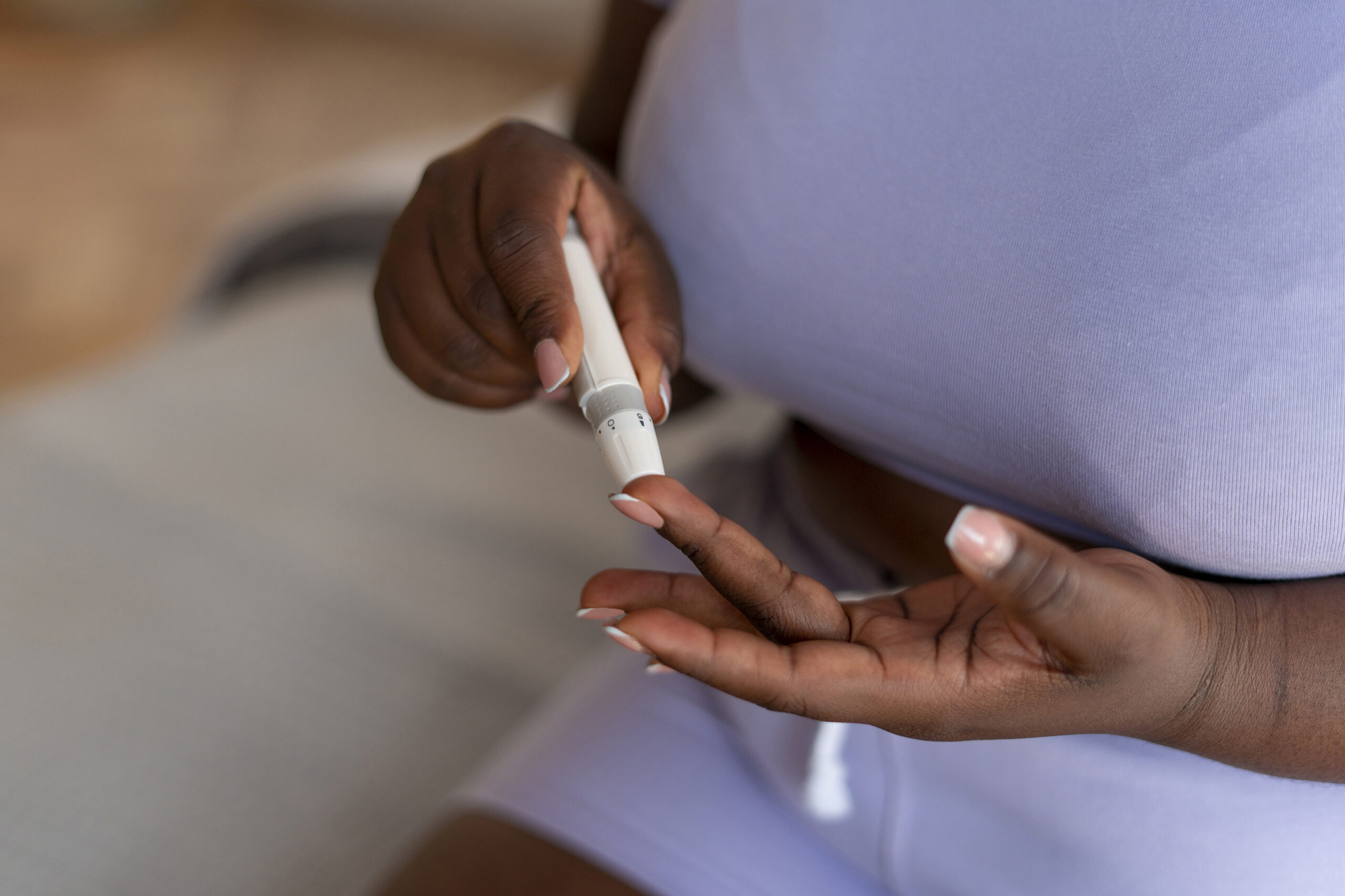 high-angle-diabetic-woman-checking-her-glucose-level